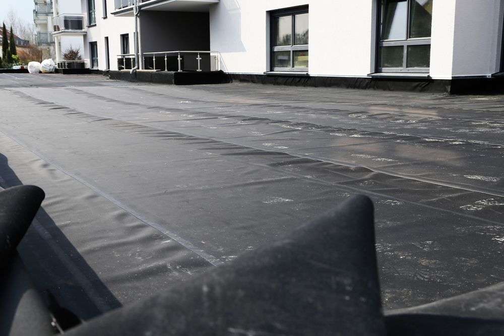 Plat dak bekleed met EPDM